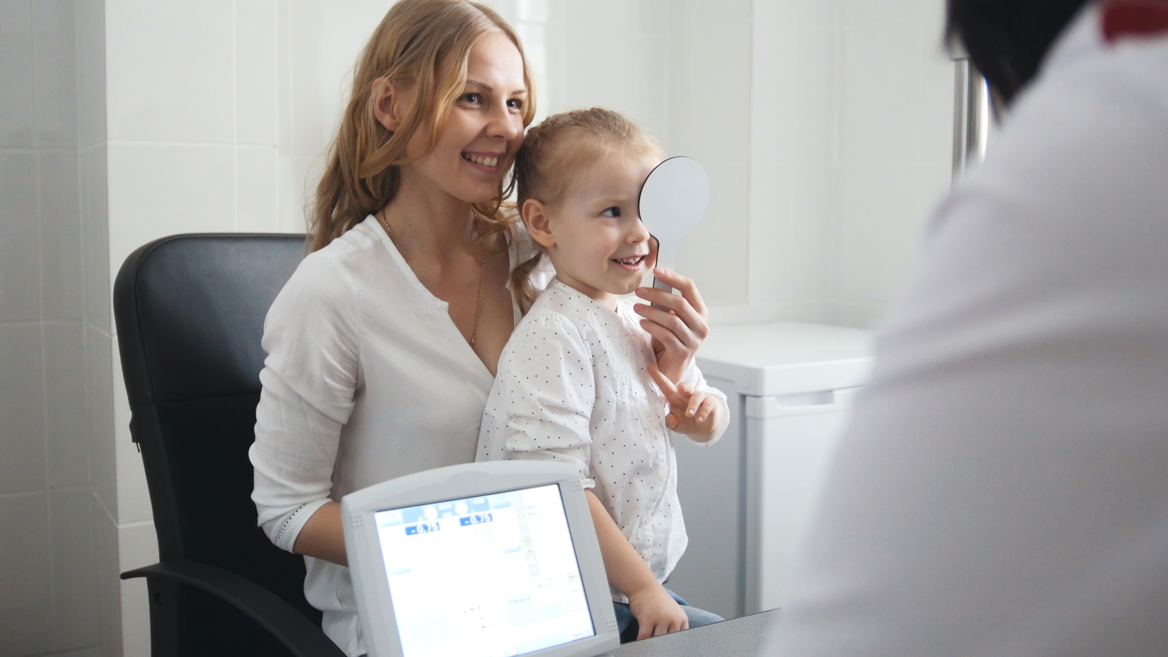 little-girl-patient-ophthalmologist-room-child-with-mommy-consultation-close-up.jpg