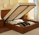 Кровать с подъемным механизмом станет лучшим выбором для маленькой спальни