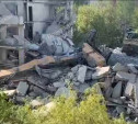 При сносе пятиэтажного дома в Липках рухнул экскаватор 