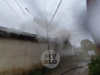 В центре Тулы загорелся автосервис: пожарные пытаются справиться с огнем, Фото: 12
