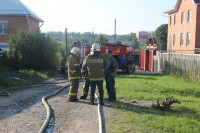 Пять пожарных расчетов тушили гараж в Туле, Фото: 6