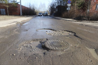 Убитая дорога на ул. Маргелова, Фото: 1