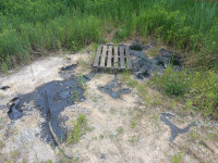 захороненные в Комарках нефтепродукты снова вышли на поверхность, Фото: 3