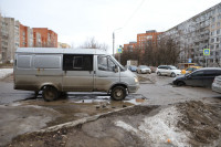 В Пролетарском районе Opel колесом провалился в дорожную яму, Фото: 8