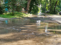 В Пролетарском районе Тулы затопило улицы и дворы: вода хлещет из колодцев, Фото: 10