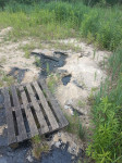 захороненные в Комарках нефтепродукты снова вышли на поверхность, Фото: 1